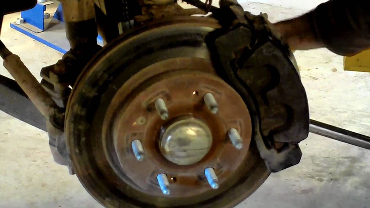 How To Replace Front Wheel Bearing Chevy Silverado 4x4 | Replicarclub.com